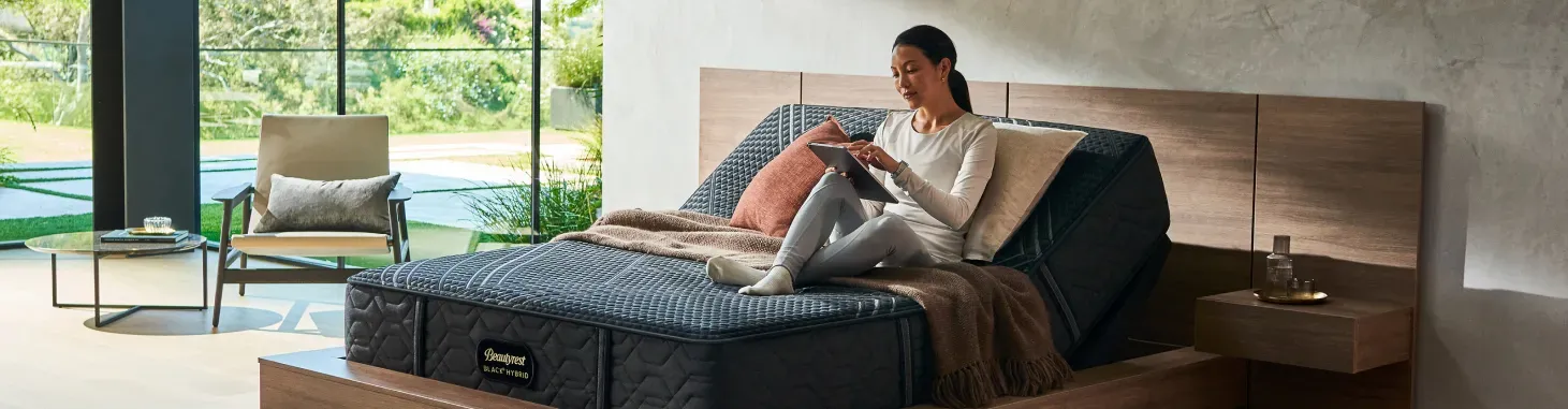 beautyrest-black-series-1-woman-on-tablet-hero